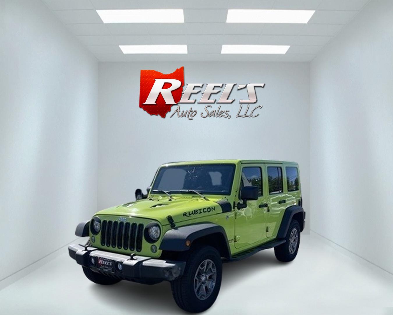 2017 Green /Black Jeep Wrangler Unlimited Rubicon 4WD (1C4BJWFG2HL) with an 3.6L V6 DOHC 24V engine, 5-Speed Automatic transmission, located at 11115 Chardon Rd. , Chardon, OH, 44024, (440) 214-9705, 41.580246, -81.241943 - This 2017 Jeep Wrangler Unlimited Rubicon is a rugged and capable off-road vehicle, equipped with a range of premium features. The exterior boasts LED headlights and fog lights, while the interior features a single-zone automatic climate control system, a 9-speaker Alpine sound system, and navigatio - Photo#0